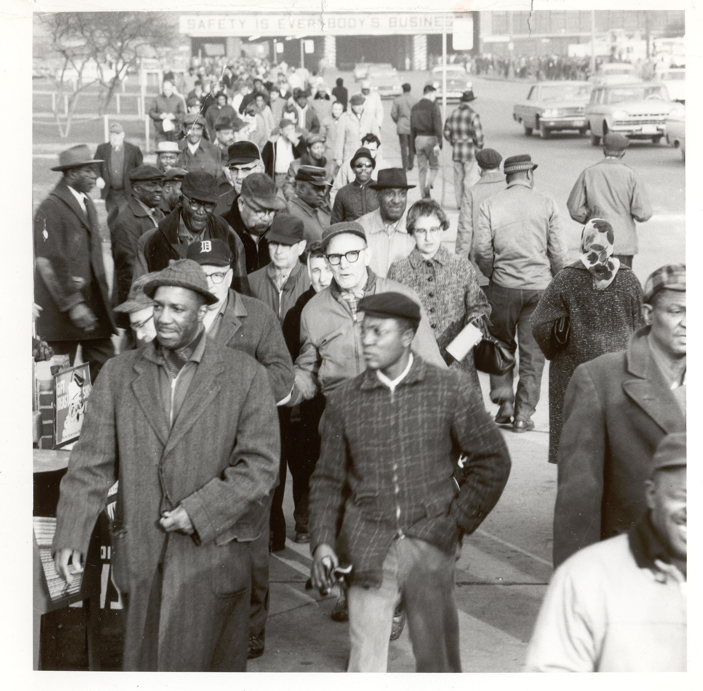 Ford employees, seen here leaving a plant, represent a burgeoning divers middle class.